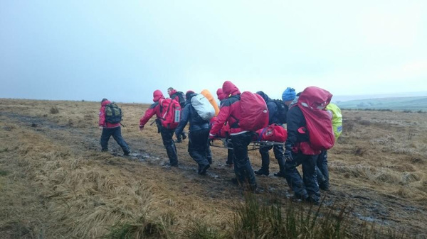 Stretcher carry-off for injured runner